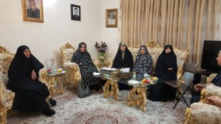  دیدار معاون رییس جمهور با خانواده و همرزمان شهید احمد غلامی