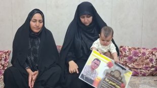 دیدار معاون رئیس‌جمهور با خانواده شهید سعید احمدی‌مینا